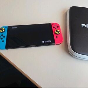Nintendo Switch with Custom Red and Blue Joy-Con
